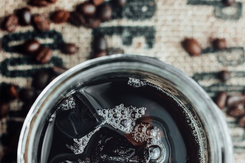 a glass of cold brew coffee from above
